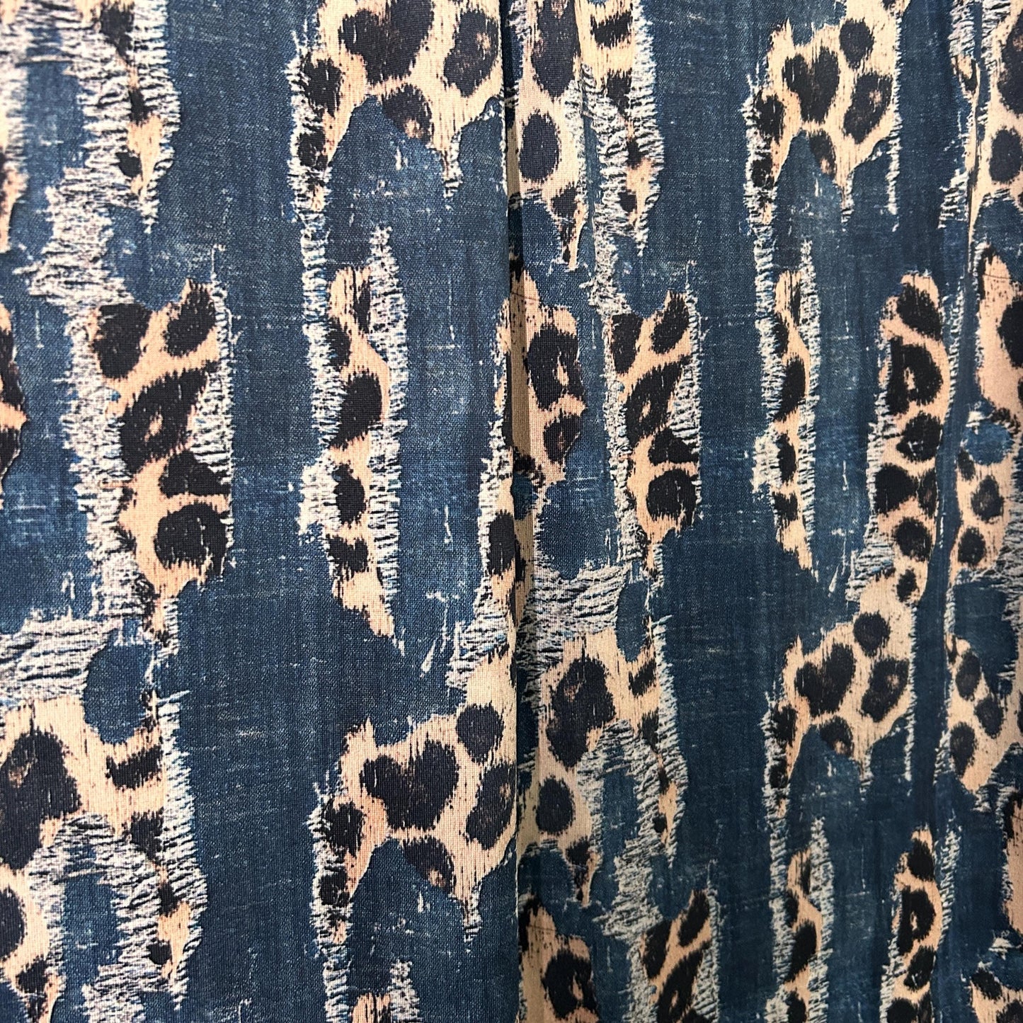 Printed denim texture fabric. Animal denim mix. 60" width. Fabric By The Yard.