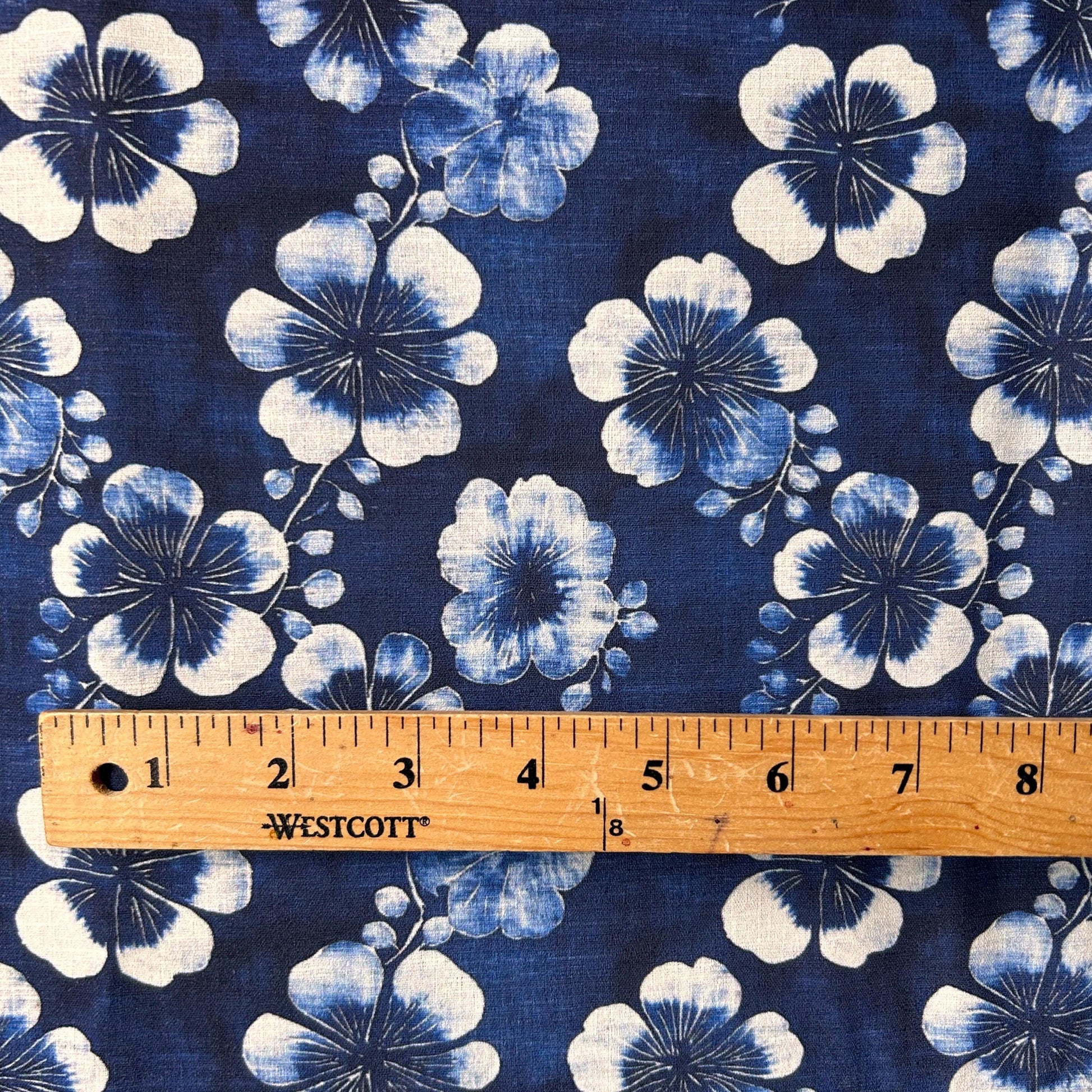 Nishigori fabric. indigo dyeing, shibori-dyed blue Tung flower pattern. fabric by yard.