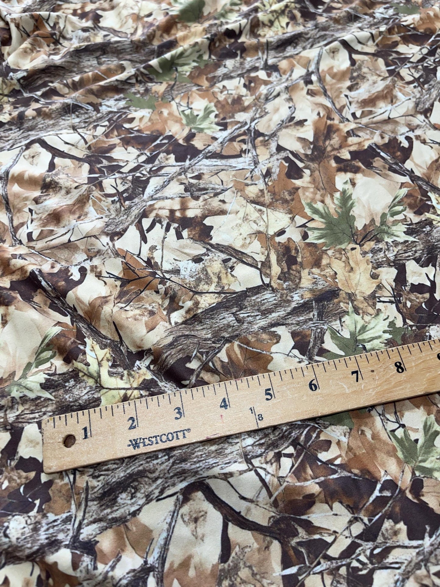 Camouflage Fabric – Realistic Tree Bark & Leaf Pattern for Outdoor Crafts, Hunting, and Apparel.