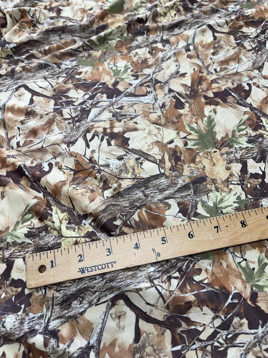 Camouflage Fabric – Realistic Tree Bark & Leaf Pattern for Outdoor Crafts, Hunting, and Apparel.