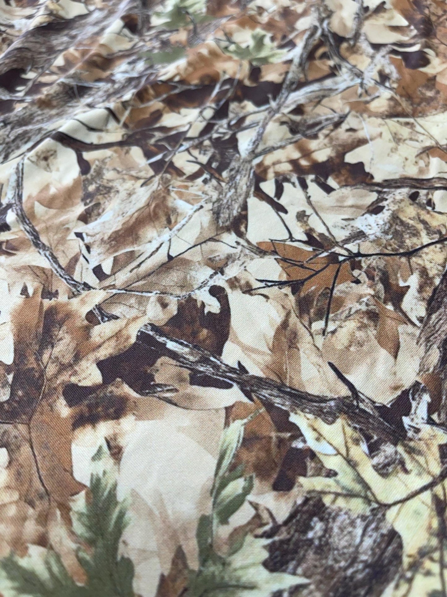 Camouflage Fabric – Realistic Tree Bark & Leaf Pattern for Outdoor Crafts, Hunting, and Apparel.