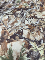 Camouflage Fabric – Realistic Tree Bark & Leaf Pattern for Outdoor Crafts, Hunting, and Apparel.
